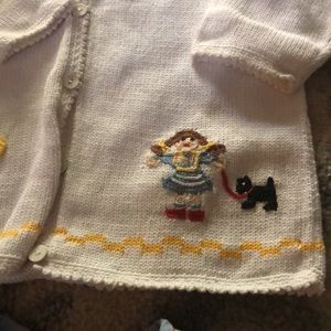 DARLING SMOCKED WIZARD OF OZ DRESS AND SWEATER